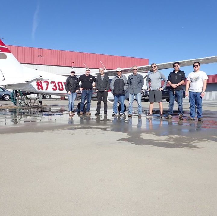 Members of Alameda Flying Club wash N73015.